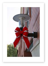 Holiday Garlands & Bows, Red & Gold Bow on Lighting Fixture